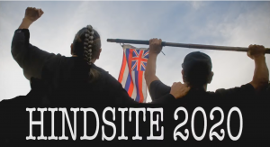 two men holding a flag, viewed from the back